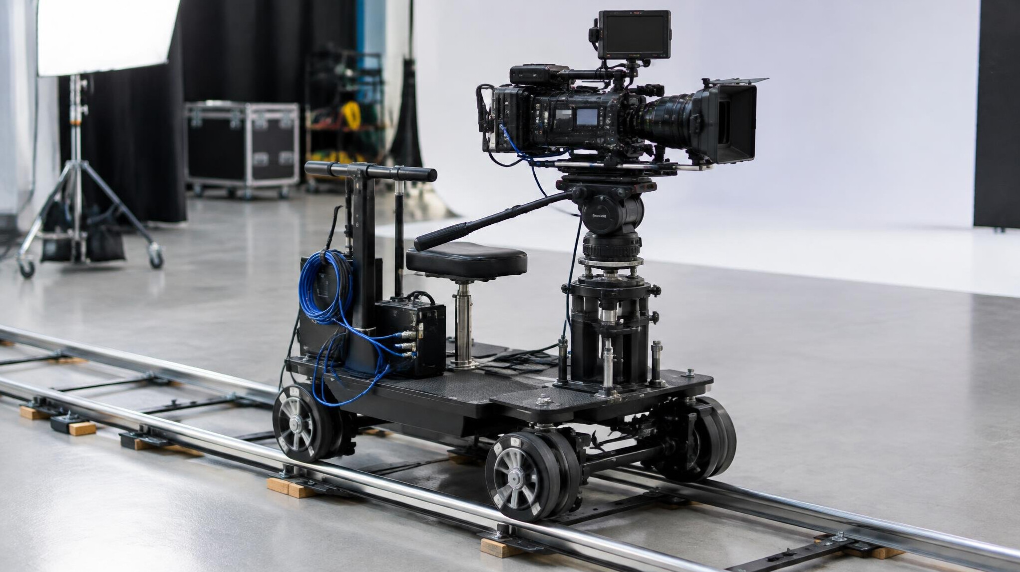 Camera dolly track setup for a smooth tracking shot